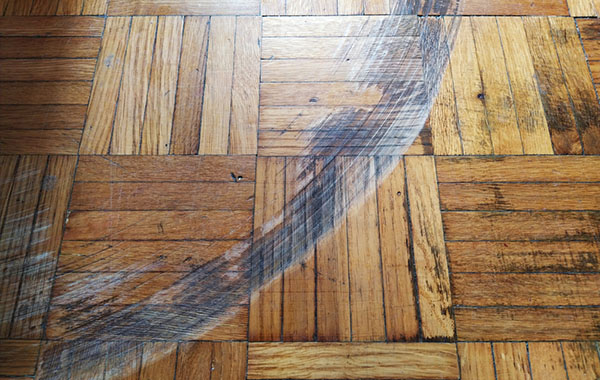 scratched parquet flooring