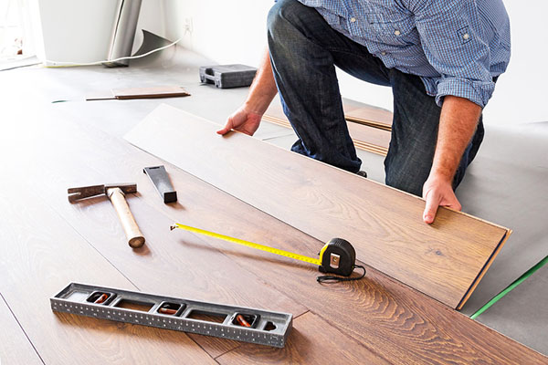 installing flooring closeup